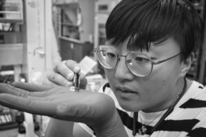 Scientist with microdevice